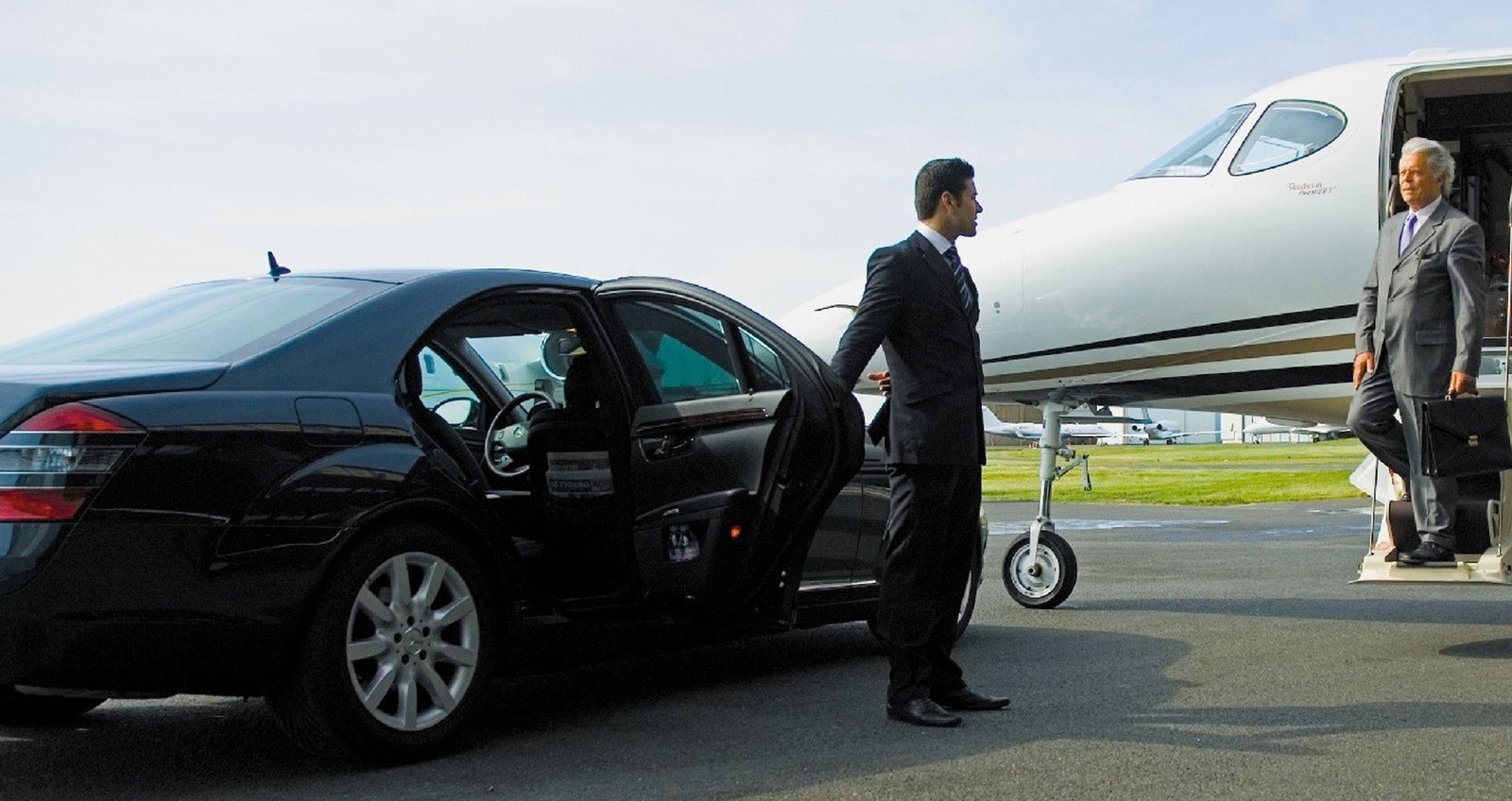 Chauffeurs England driver greeting a client